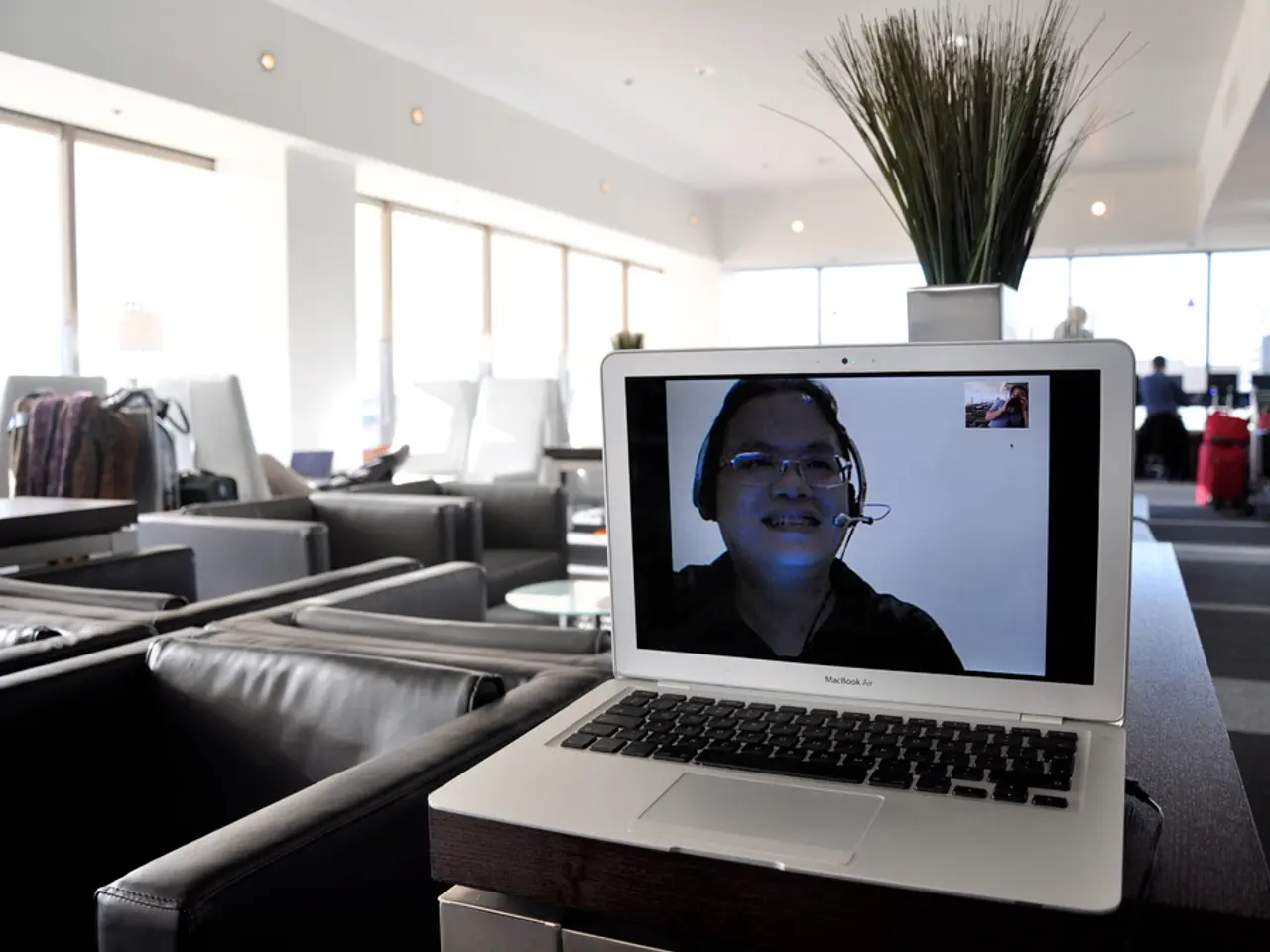 In this image, we can see sofas ,chairs, tables, few items are placed on it. At the center, there...