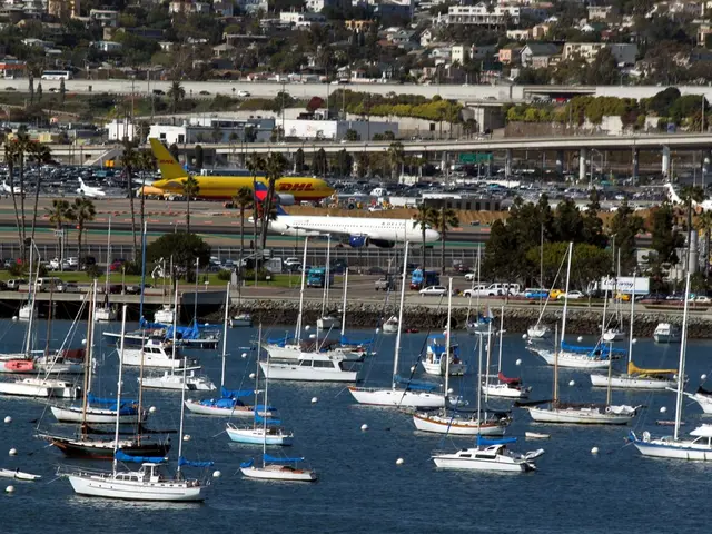 In this picture there are ships on the water at the bottom side of the image and there are...