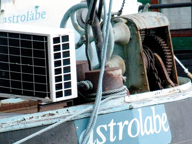 In this image in the front there is an object which is black in colour with some text written on it...