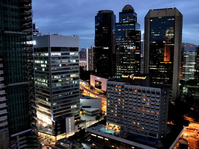 In this image I see number of buildings and I see a swimming pool over here and I see a board over...