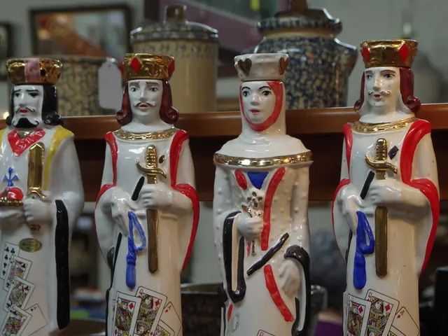 In the image there are many idols on shelves and behind it there are jars.