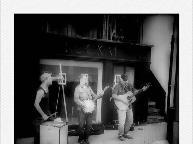 This picture is clicked outside the city. Here, we see three men standing and playing musical...